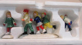 The Original Snow Village "Crack the Whip Skaters" #5171-3