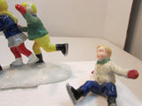 The Original Snow Village "Crack the Whip Skaters" #5171-3