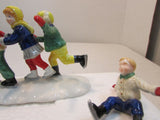 The Original Snow Village "Crack the Whip Skaters" #5171-3